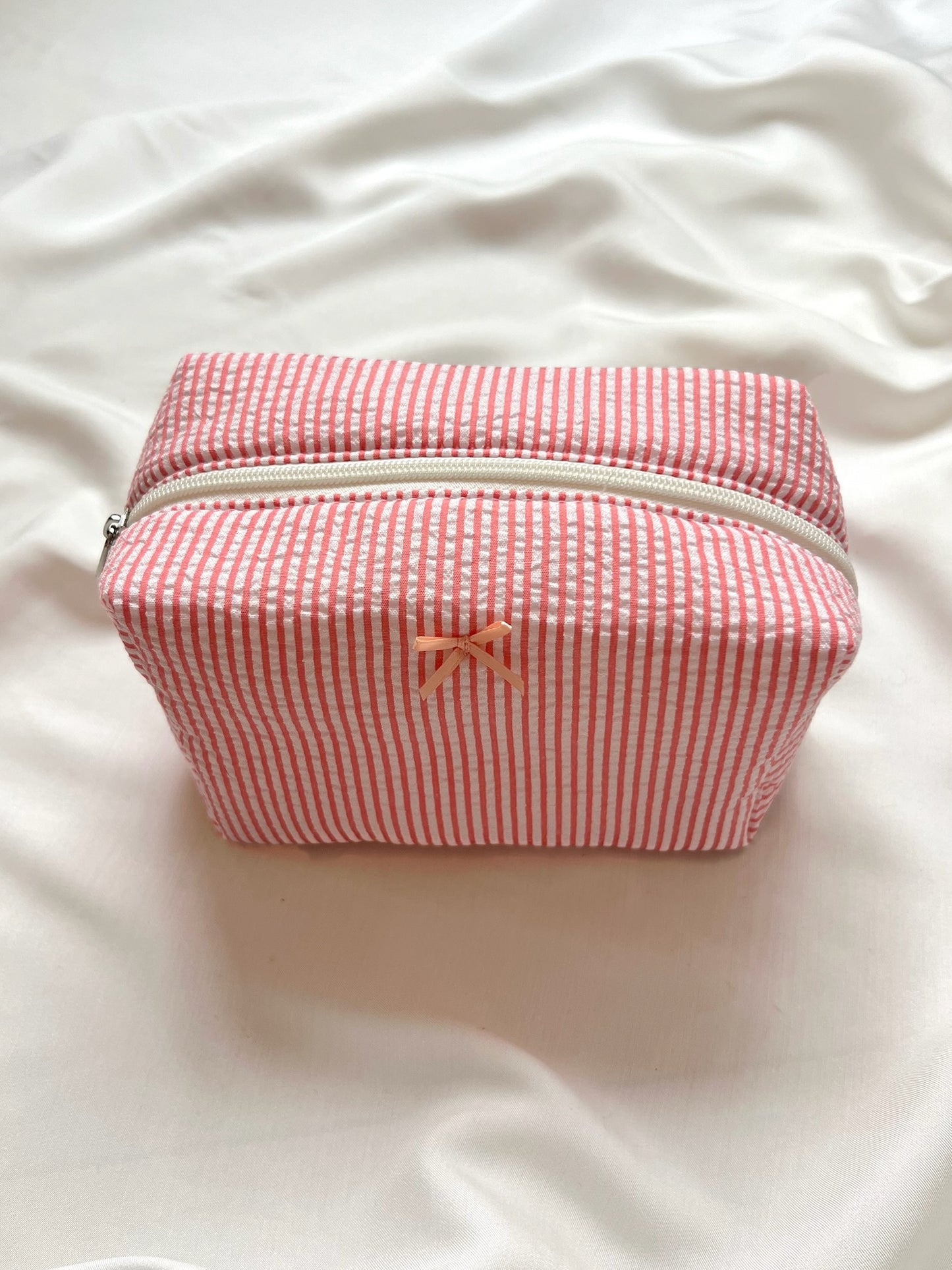 תיק איפור פסים ורוד