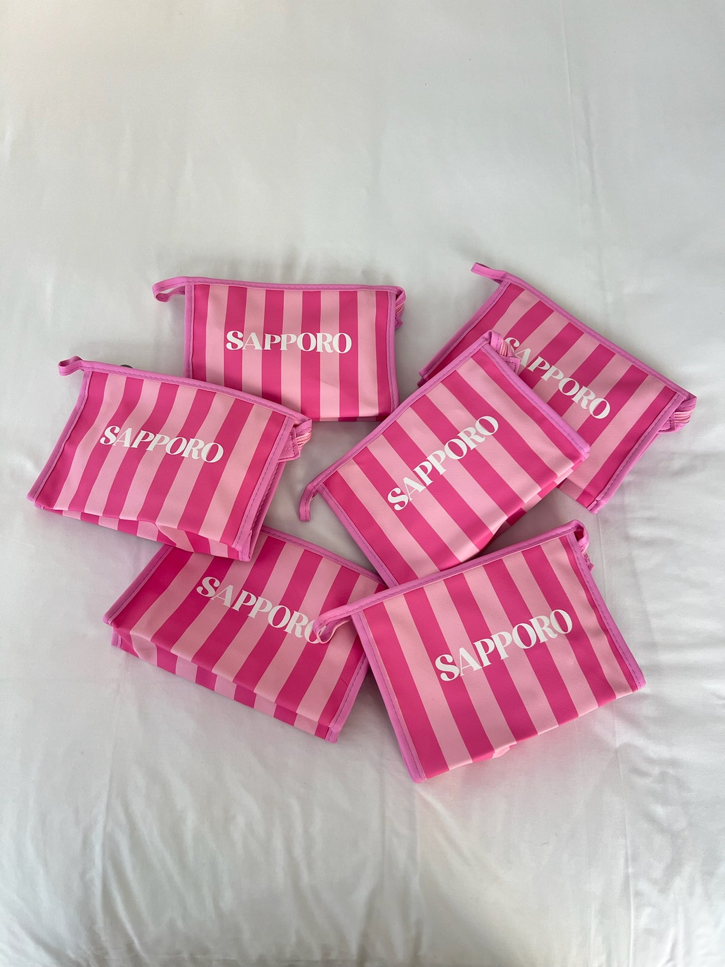 תיק איפור ורוד פסים