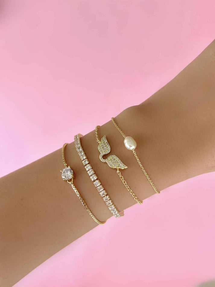 ארבע צמידי זהובים על הזרוע - סאפורו