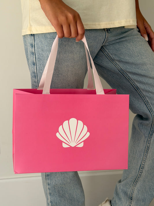 שקית אריזה ורודה ממותגת גדולה