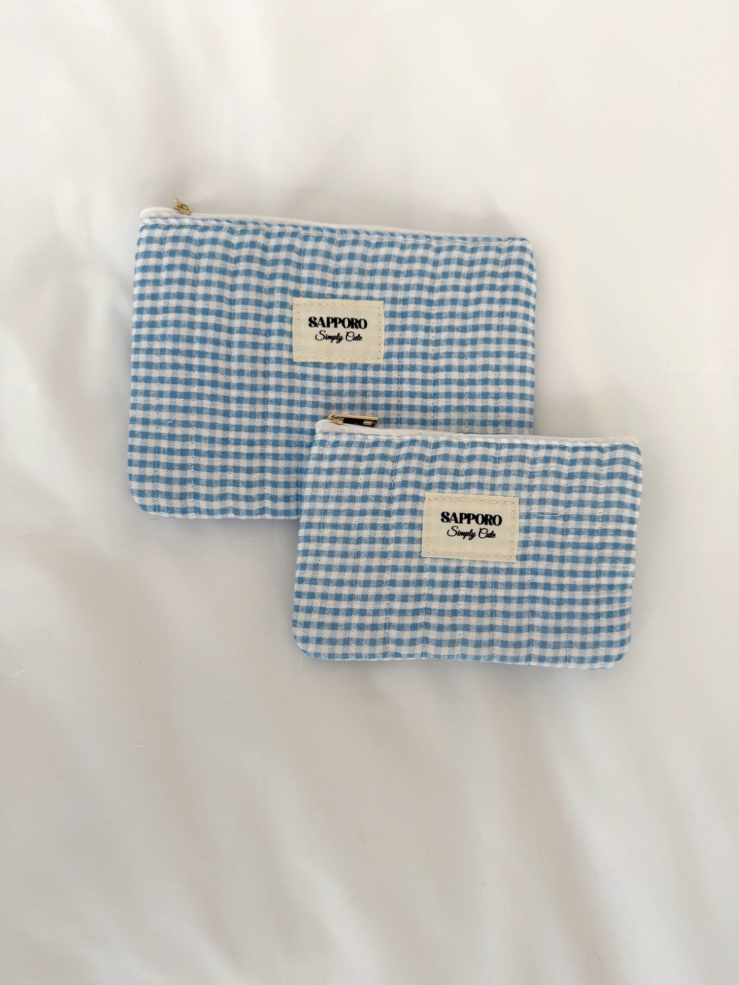 סט תיקי איפור משבצות כחול