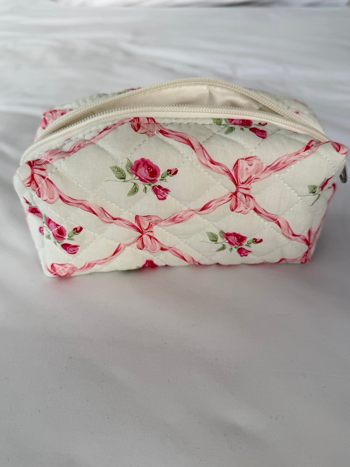 תיק איפור פפיונים ורודים