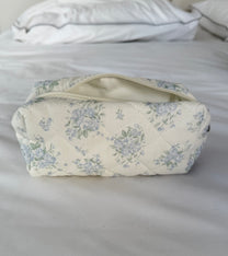 תיק איפור פרחים תכלת