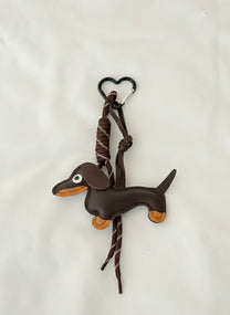 מחזיק לתיק כלב בצבע חום