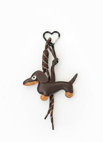 מחזיק לתיק כלב בצבע חום